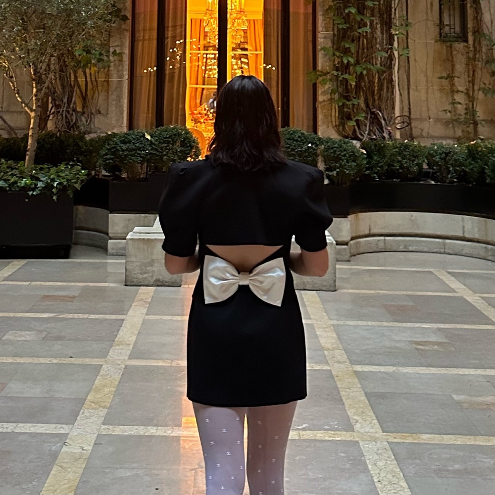 Nana Jacqueline iconic black bow dress